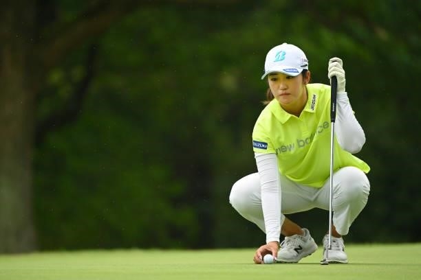 Mone Inami of Japan lines up a putt on the 8th green during the third round of the Ai Miyazato Suntory Ladies Open at Rokko Kokusai Golf Club on June...