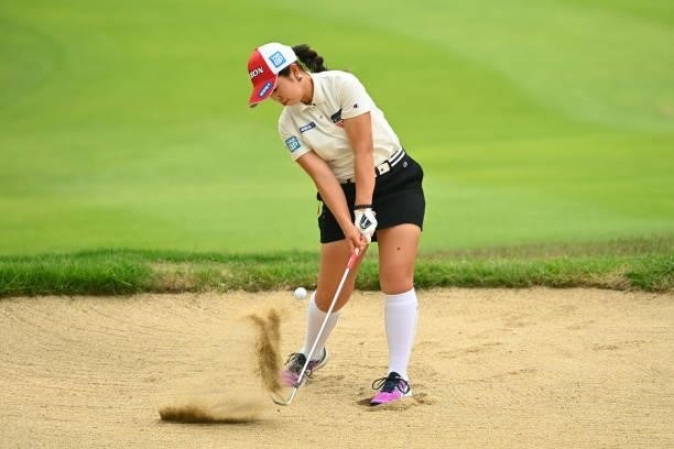 Miyuu Yamashita of Japan hits her second shot out of a bunker on the 7th hole during the third round of the Ai Miyazato Suntory Ladies Open at Rokko...