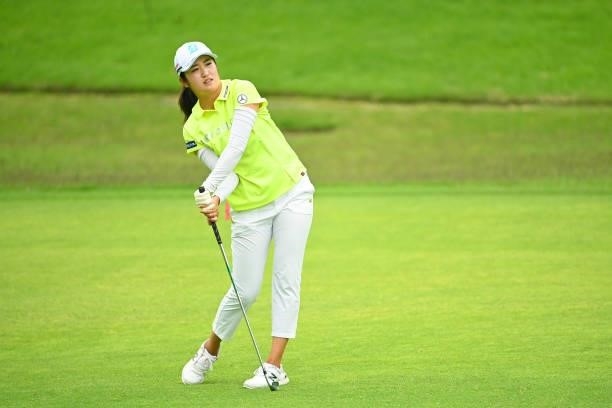 Mone Inami of Japan reacts after her second shot on the 7th hole during the third round of the Ai Miyazato Suntory Ladies Open at Rokko Kokusai Golf...