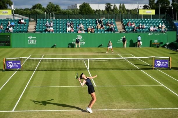Katie Boulter of Great Britain serves to Lauren Davis of United States during the women's singles match on day seven at Nottingham Tennis Centre on...