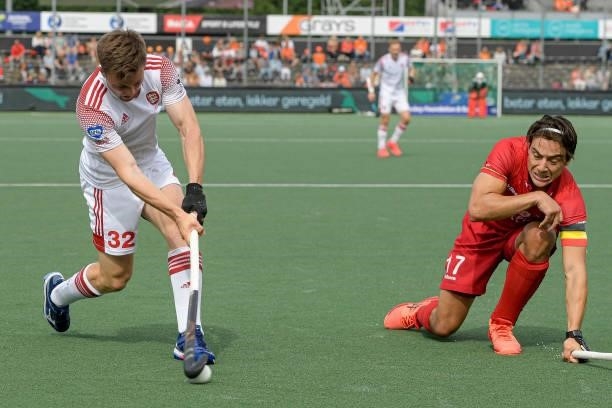 Zachary Wallace of England, Thomas Briels of Belgium during the Euro Hockey Championships Men match between England and Belgium at Wagener Stadion on...