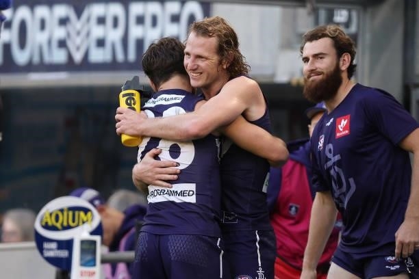 Lachie Shultz and David Mundy of the Dockers celebrate winning the round 13 AFL match between the Fremantle Dockers and the Gold Coast Suns at Optus...