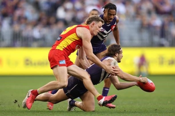 James Aish of the Dockers in action during the round 13 AFL match between the Fremantle Dockers and the Gold Coast Suns at Optus Stadium on June 12,...