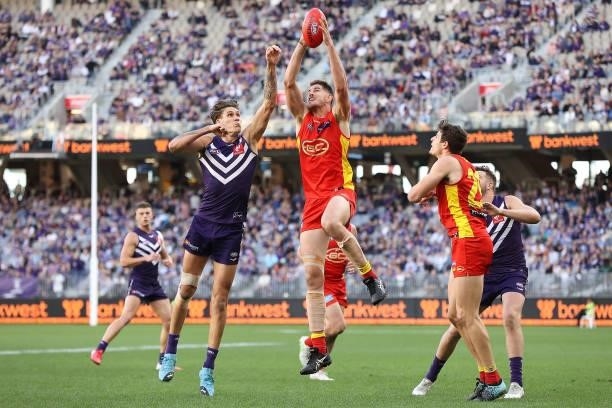 Zac Smith of he Suns marks the ball during the round 13 AFL match between the Fremantle Dockers and the Gold Coast Suns at Optus Stadium on June 12,...