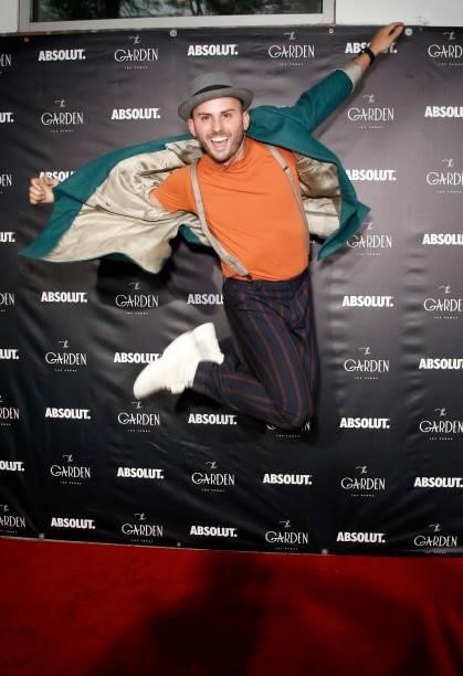 Entertainer and Greater Heights Creative creator Gianni Howell leaps into the air during the one year anniversary party at The Garden Las Vegas on...