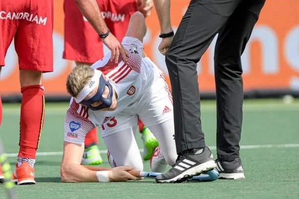Sam Ward of England injured during the Euro Hockey Championships Men match between England and Belgium at Wagener Stadion on June 12, 2021 in...