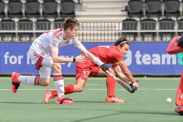 Liam Sanford of England, Thomas Briels of Belgium during the Euro Hockey Championships Men match between England and Belgium at Wagener Stadion on...