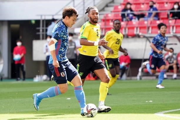 Ayase Ueda of Japan U-24 scores his side's third goal during the U-24 international friendly match between Japan and Jamaica at the Toyota Stadium on...
