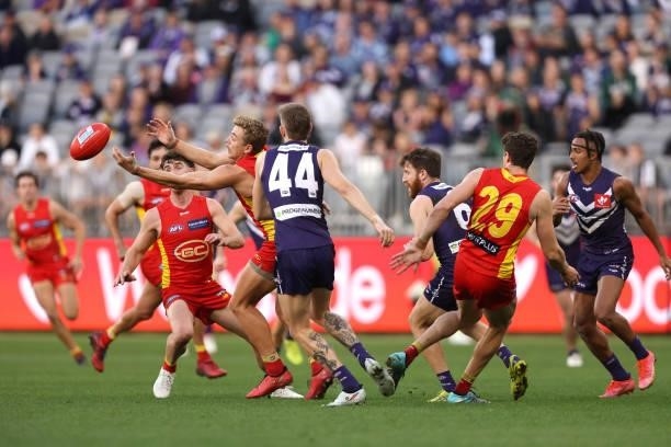 Hugh Greenwood of the Suns looks to win possession during the round 13 AFL match between the Fremantle Dockers and the Gold Coast Suns at Optus...