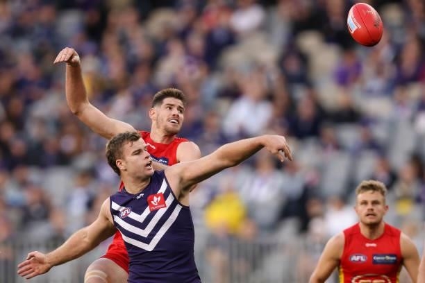 Sean Darcy of the Dockers and Zac Smith of he Suns contest the ruck during the round 13 AFL match between the Fremantle Dockers and the Gold Coast...