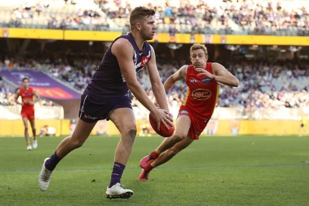 Luke Ryan of the Dockers in action during the round 13 AFL match between the Fremantle Dockers and the Gold Coast Suns at Optus Stadium on June 12,...