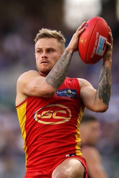 Brandon Ellis of the Suns marks the ball during the round 13 AFL match between the Fremantle Dockers and the Gold Coast Suns at Optus Stadium on June...