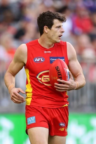 Chris Burgess of the Suns looks on during the round 13 AFL match between the Fremantle Dockers and the Gold Coast Suns at Optus Stadium on June 12,...