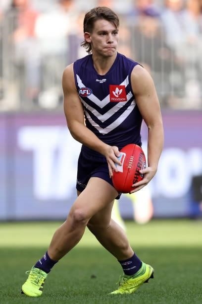 Caleb Serong of the Dockers in action during the round 13 AFL match between the Fremantle Dockers and the Gold Coast Suns at Optus Stadium on June...