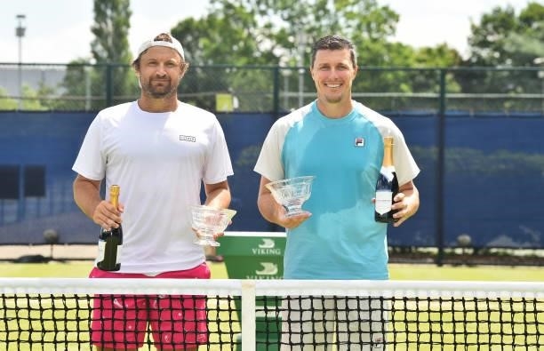Matt Reid of Australia and Ken Skupski of Great Britain pose with the Viking Nottingham Mens Doubles Trophy on day eight after at Nottingham Tennis...