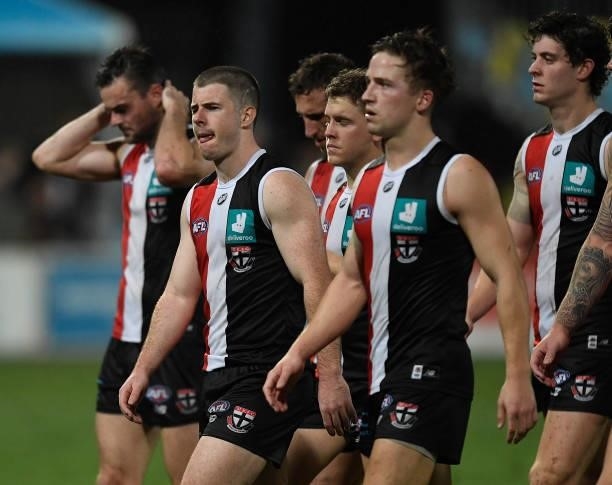 The Saints walk from the field after losing the round 13 AFL match between the St Kilda Saints and the Adelaide Crows at Cazaly's Stadium on June 12,...