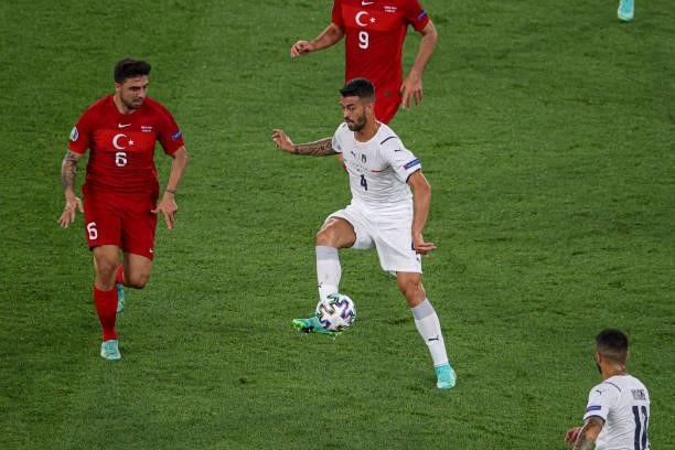 Ozan Tufan of Turkey, Leonardo Spinazzola of Italy during the UEFA Euro 2020 Group A match between Turkey and Italy at Stadio Olympico on June 11,...