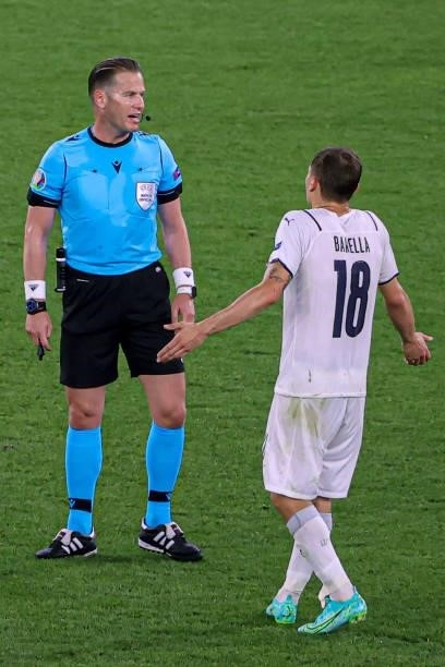 Referee Danny Makkelie, Nicolo Barella of Italy during the UEFA Euro 2020 Group A match between Turkey and Italy at Stadio Olympico on June 11, 2021...