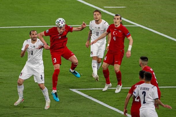 Giorgio Chiellini of Italy, Merih Demiral of Turkey, Ciro Immobile of Italy, Caglar Soyuncu of Turkey during the UEFA Euro 2020 Group A match between...