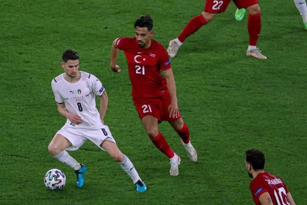 Jorginho of Italy, Irfan Can Kahveci of Turkey during the UEFA Euro 2020 Group A match between Turkey and Italy at Stadio Olympico on June 11, 2021...