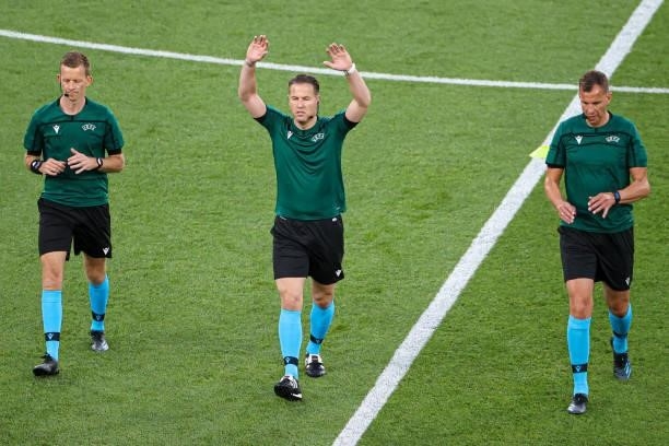 Referee Danny Makkelie, assistant referee Hessel Heegstra, assistant referee Jan de Vries during the UEFA Euro 2020 Group A match between Turkey and...