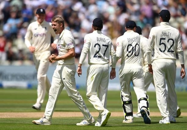 England bowler Olly Stone celebrates with team mates after taking the wicket of Daryl Mitchell during day three of the second LV= Insurance Test...