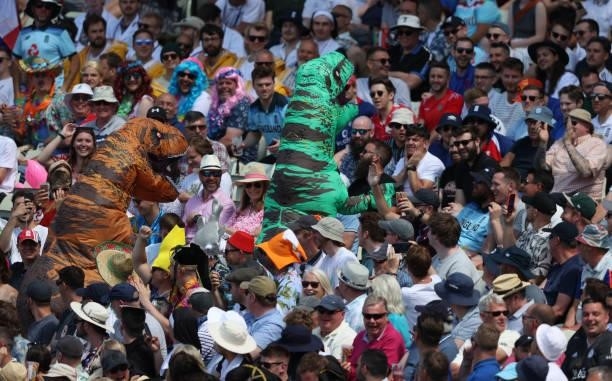 Fans dressed as Dinosaurs in the Hollies Stand amongst the throng during day three of the second LV= Insurance Test Match between England and New...