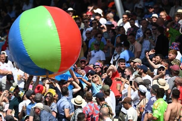 An inflatable Beach Ball is thrown around the Hollies Stand by amused spectators during day three of the second LV= Insurance Test Match between...