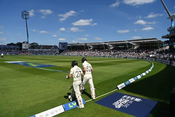 England opening batsman Dom Sibley and Rory Burns head out to bat in the second innings during day three of the second LV= Insurance Test Match...