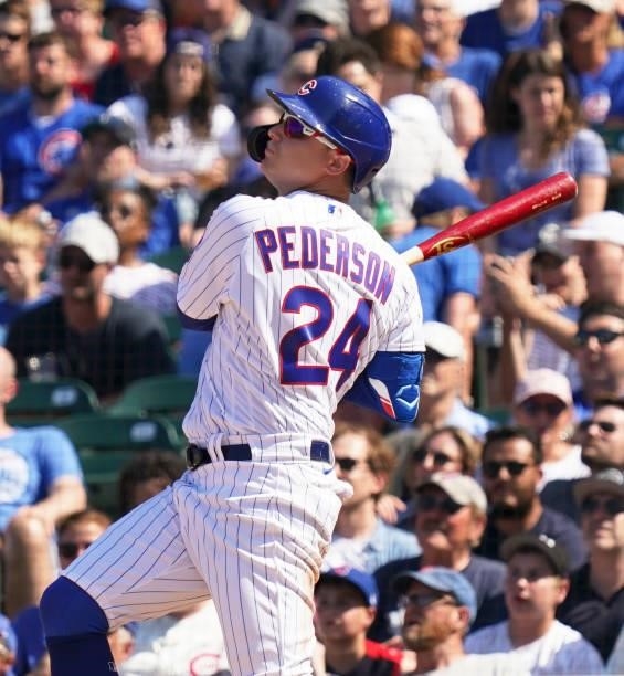 Joc Pederson of the Chicago Cubs hits a two-run double during the seventh inning of a game against the St. Louis Cardinals at Wrigley Field on June...