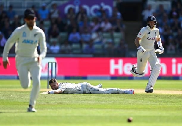 New Zealand bowler Matt Henry looks on as England batsman Joe Root picks up some runs during day three of the second LV= Insurance Test Match between...