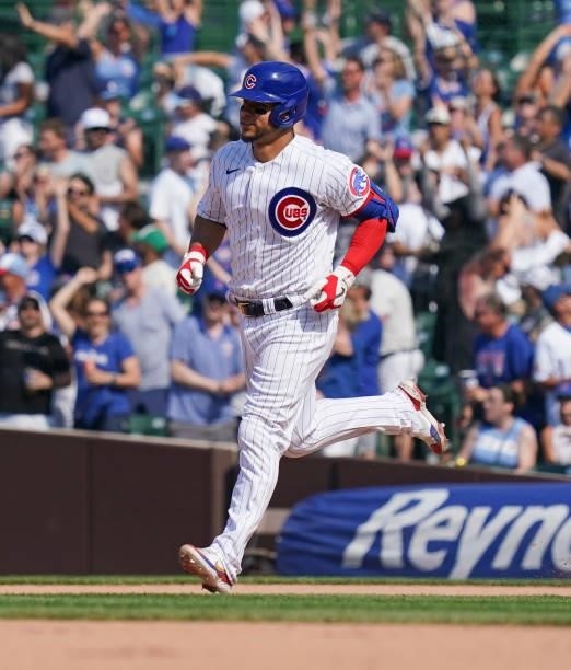 Willson Contreras of the Chicago Cubs hits a home run during the eighth inning of a game against the St. Louis Cardinals at Wrigley Field on June 11,...