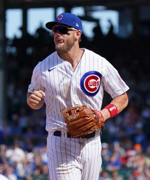 Patrick Wisdom of the Chicago Cubs runs to the dugout during the eighth inning of a game against the St. Louis Cardinals at Wrigley Field on June 11,...