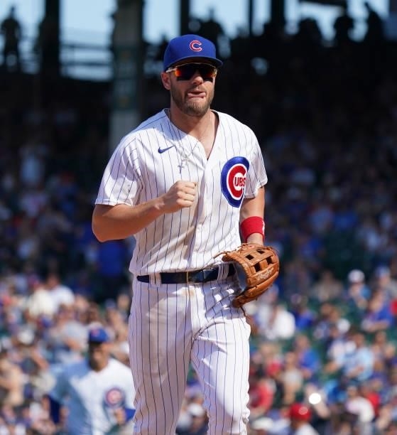 Patrick Wisdom of the Chicago Cubs runs to the dugout during the eighth inning of a game against the St. Louis Cardinals at Wrigley Field on June 11,...