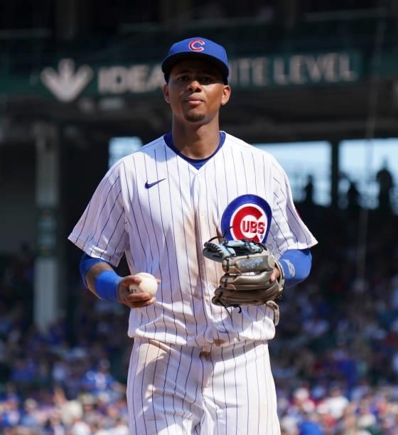 Sergio Alcántara of the Chicago Cubs runs to the dugout during the eighth inning of a game against the St. Louis Cardinals at Wrigley Field on June...