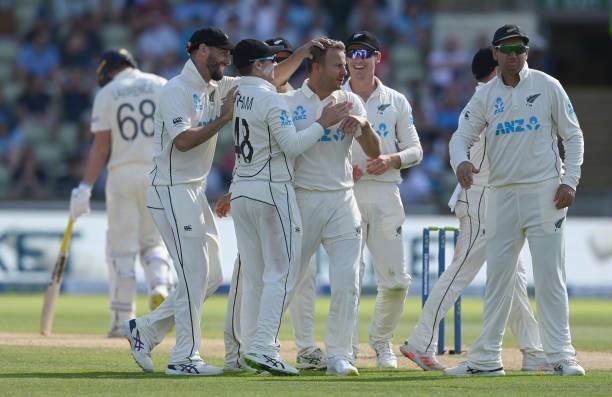 Neil Wagner of New Zealand is congratulated after dismissing Dan Lawrence of England during the third day of the second LV= Test Match between...