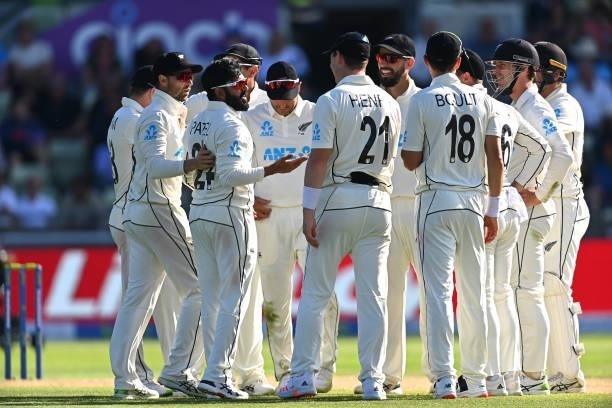 New Zealand bowler Ajaz Patel is congratulated by team mates after taking the wicket of England batsman Joe Root during day three of the second LV=...