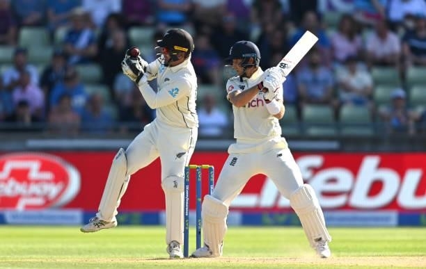 England captain Joe Root is caught behind by Wicketkeeper Tom Blundell off the bowling of Ajaz Patel for 11 runs during day three of the second LV=...
