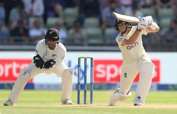 Joe Root of England hits out watched by Tom Blundell of New Zealand during the third day of the second LV= Test Match between England and New Zealand...