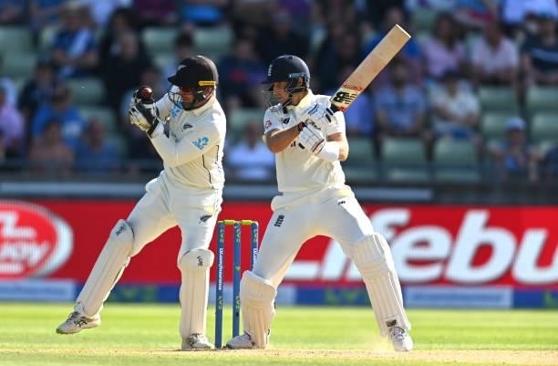 England captain Joe Root is caught behind by Wicketkeeper Tom Blundell off the bowling of Ajaz Patel for 11 runs during day three of the second LV=...