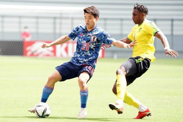 Ritsu Doan of Japan U-24 in action during the U-24 international friendly match between Japan and Jamaica at the Toyota Stadium on June 12, 2021 in...