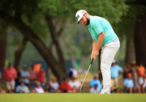 Tyrrell Hatton of England putts on the first green during the third round of the Palmetto Championship at Congaree on June 12, 2021 in Ridgeland,...