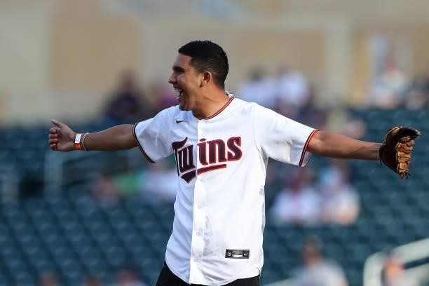 Emanuel Reynoso of Minnesota United celebrates after throwing the ceremonial first pitch before the game at Target Field between the New York Yankees...