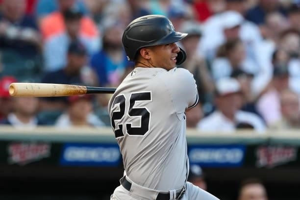 Gleyber Torres of the New York Yankees hits a single against the Minnesota Twins in the third inning of the game at Target Field on June 10, 2021 in...