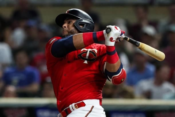 Nelson Cruz of the Minnesota Twins hits an RBI double against the New York Yankees in the seventh inning of the game at Target Field on June 10, 2021...