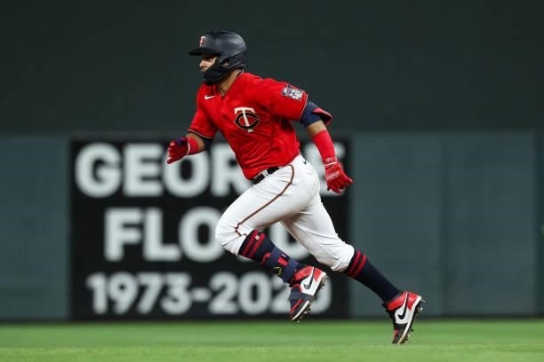 Gilberto Celestino of the Minnesota Twins advances to second base after hitting a single against the New York Yankees in the eighth inning of the...