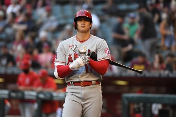 Shohei Ohtani of the Los Angeles Angels gets ready to step into the batters box against the Arizona Diamondbacks during the first inning at Chase...