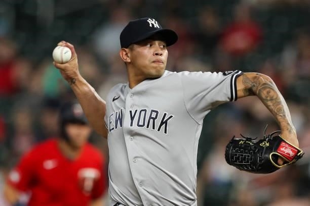 Jonathan Loaisiga of the New York Yankees delivers a pitch against the Minnesota Twins in the fifth inning of the game at Target Field on June 10,...