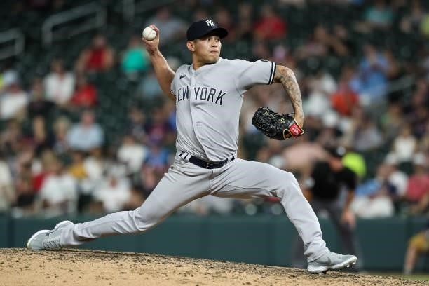 Jonathan Loaisiga of the New York Yankees delivers a pitch against the Minnesota Twins in the sixth inning of the game at Target Field on June 10,...