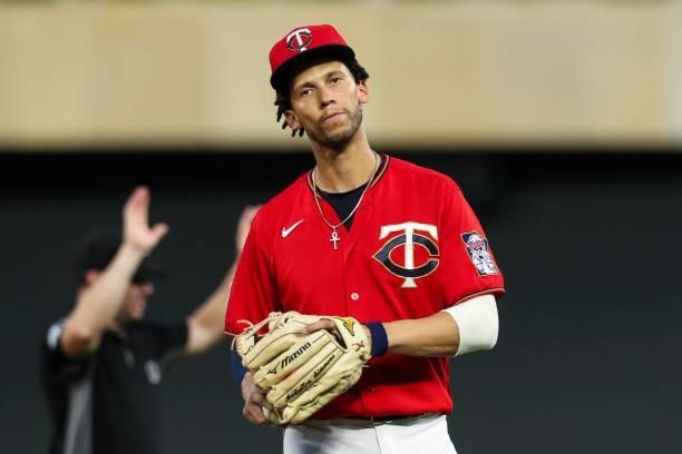 Andrelton Simmons of the Minnesota Twins reacts after committing a fielding error against the New York Yankees in the fifth inning of the game at...